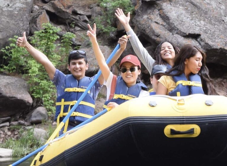 group of four celebrating a nice boat ride